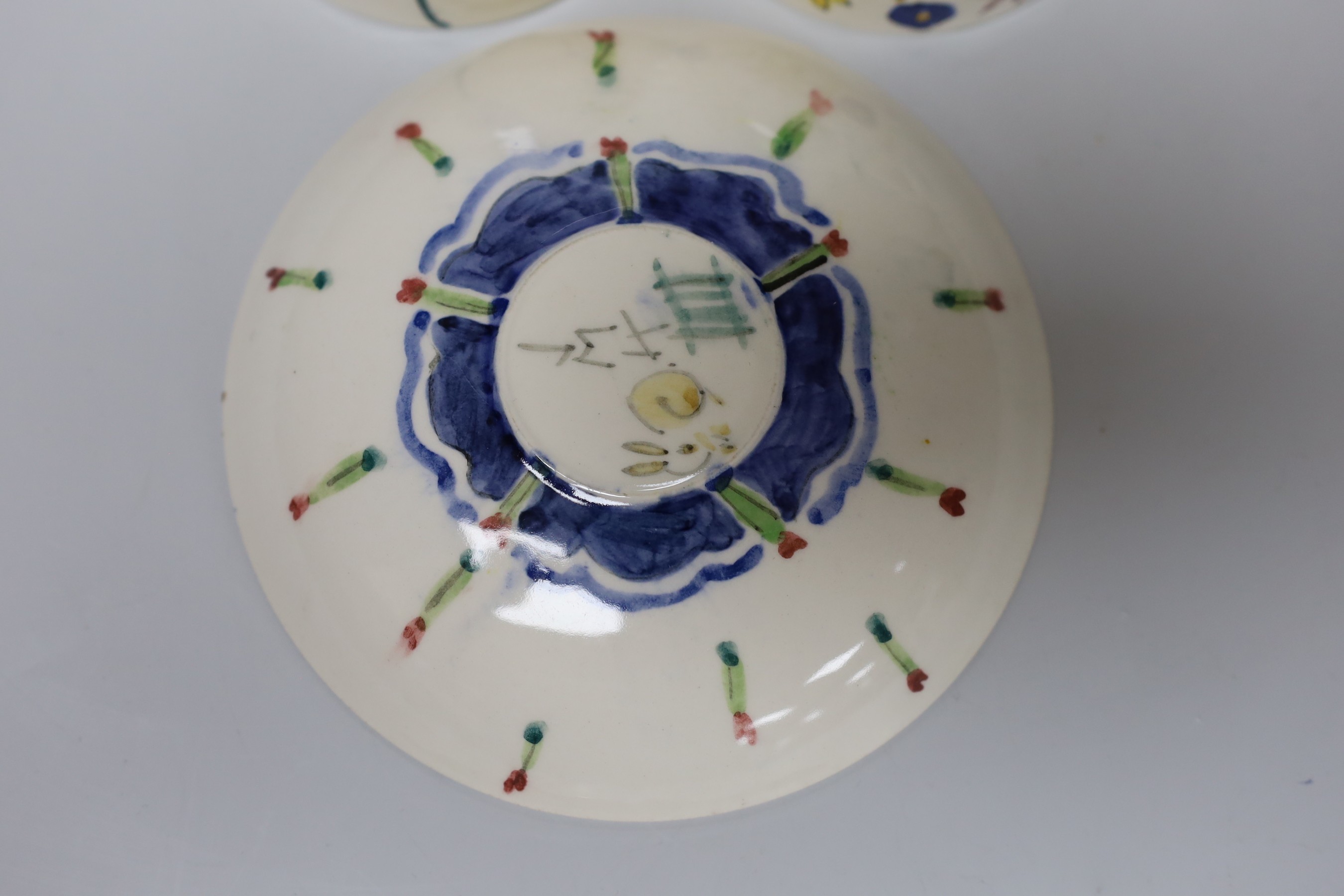 Jessie Marion King (1875-1949). Three different floral design tea cups, saucers and plates